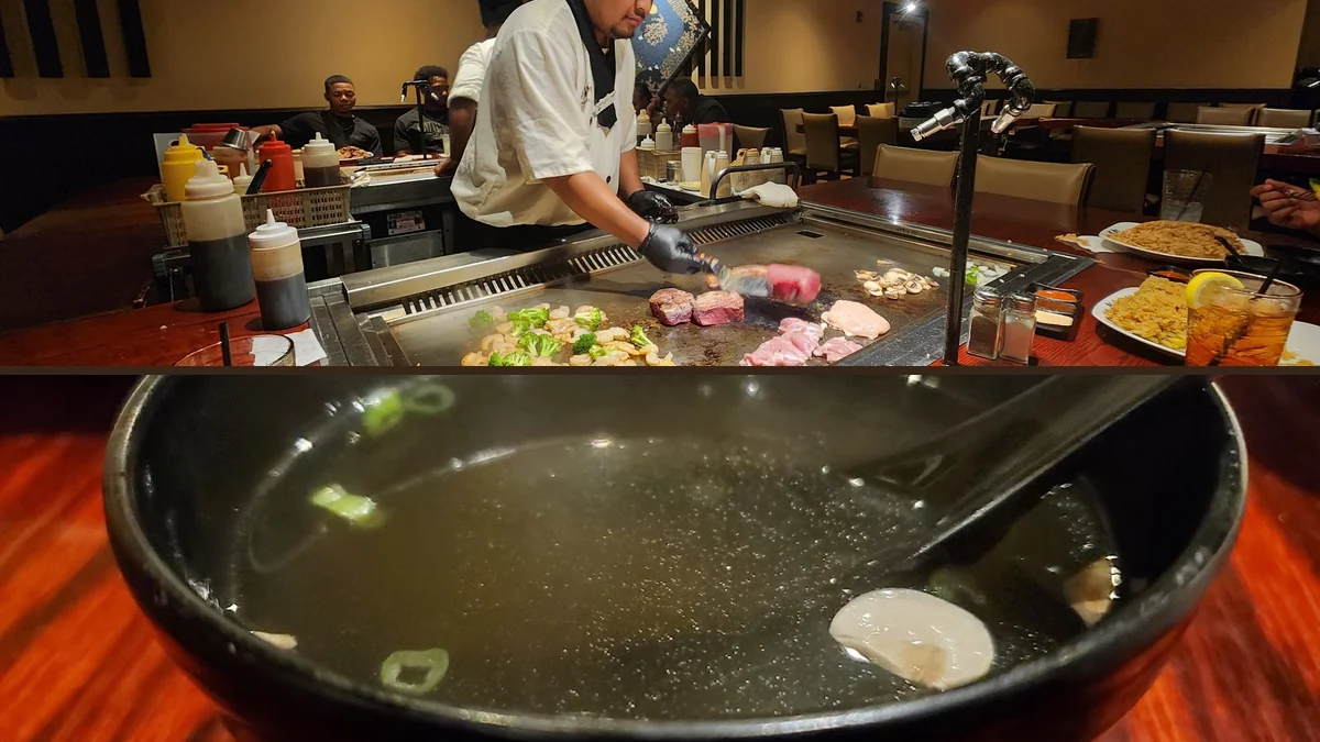 Sizzling hibachi grill with plated Japanese entrées.