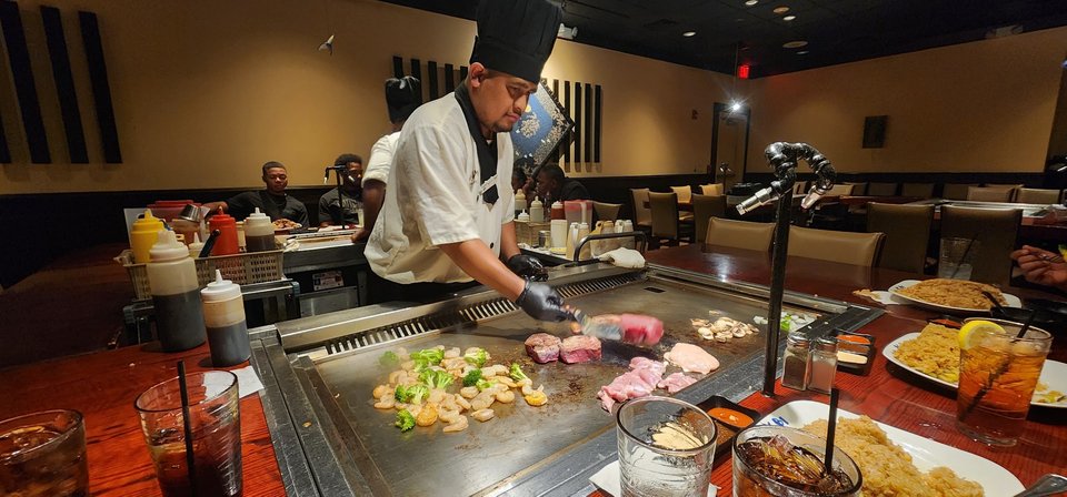 Shared grill table ready for dinner service.