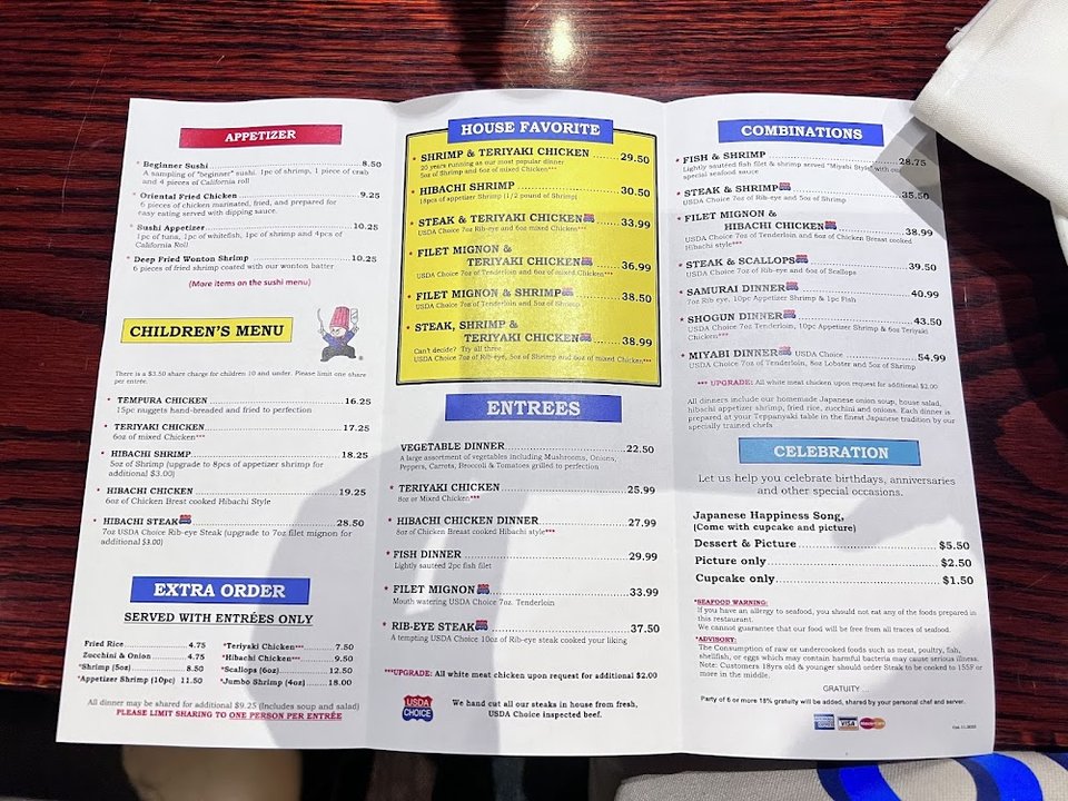 Printed menu with hibachi, sushi, and steakhouse choices.